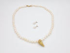 Akoya pearl necklace with gold shell - Echoes of the Sea